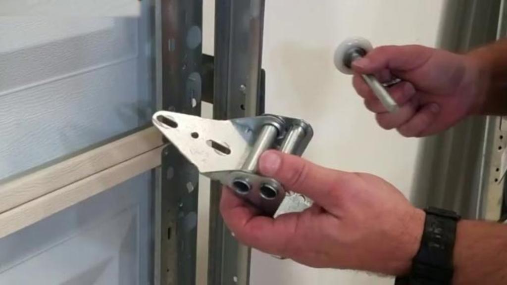 Installing heavy-duty nylon garage door rollers for a quieter operation