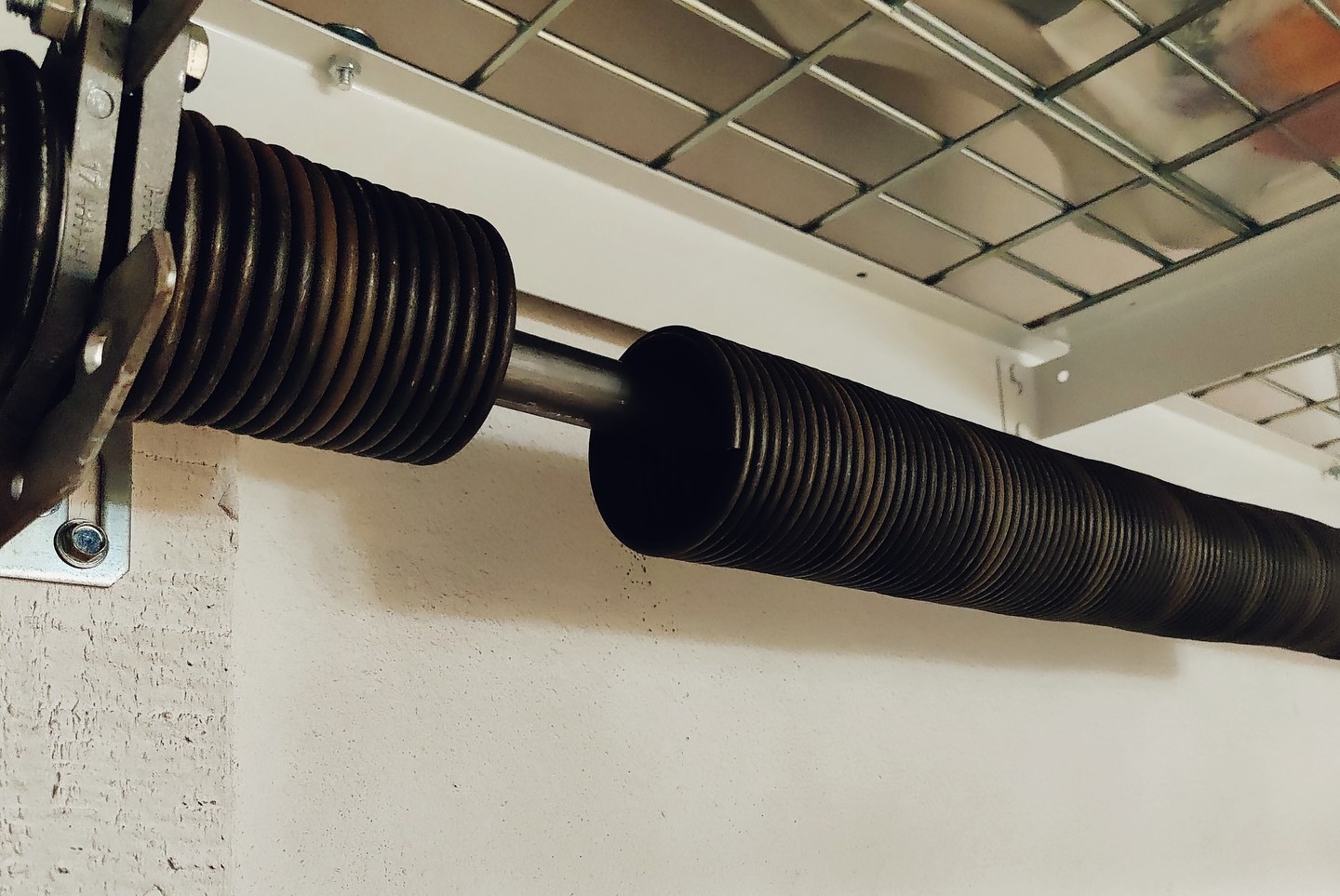 A broken garage door spring in Santa Ana