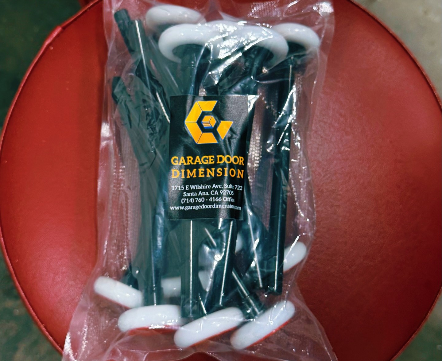 A set of garage door rollers from Garage Door Dimension