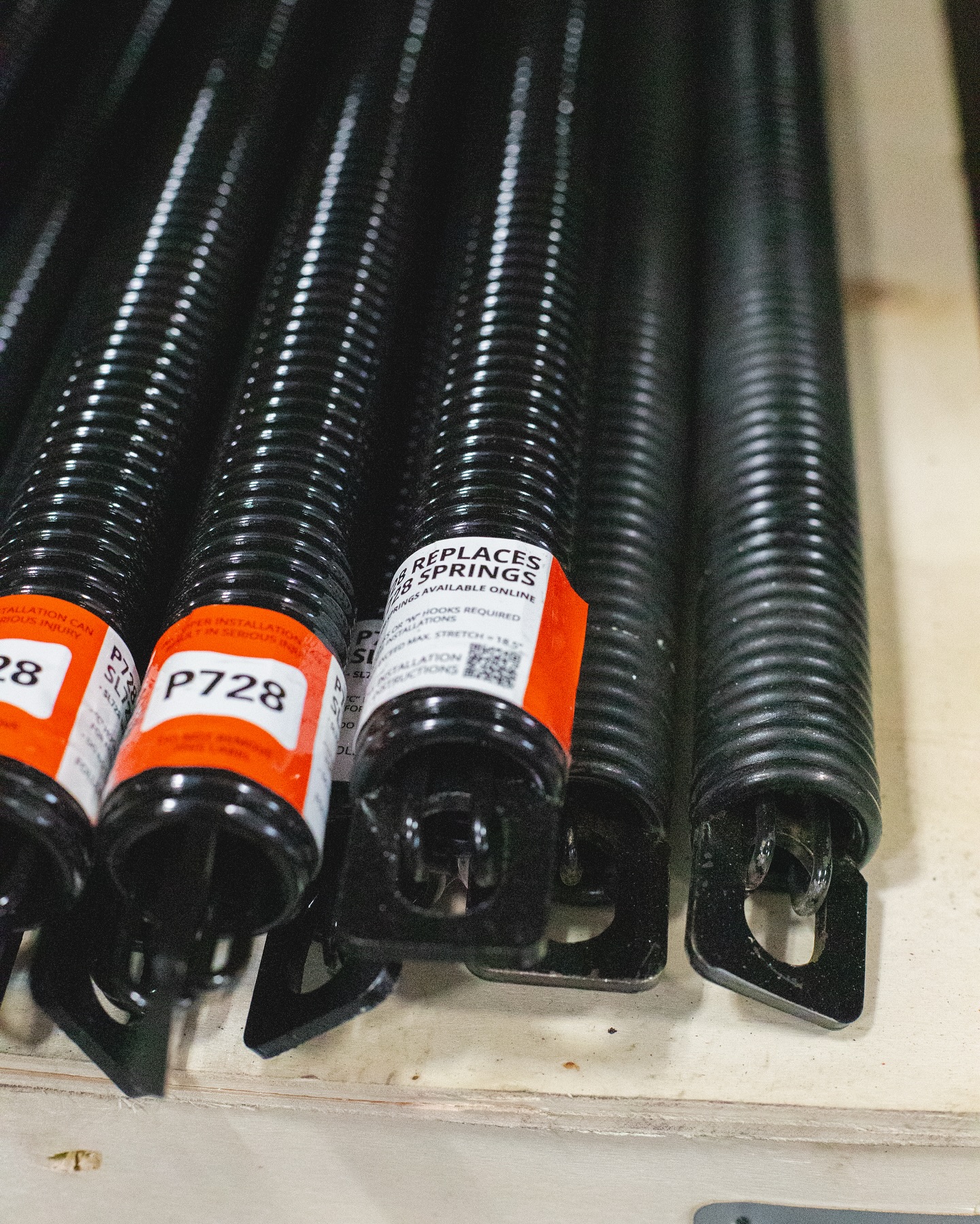 A stockpile of garage door extension springs in Orange County