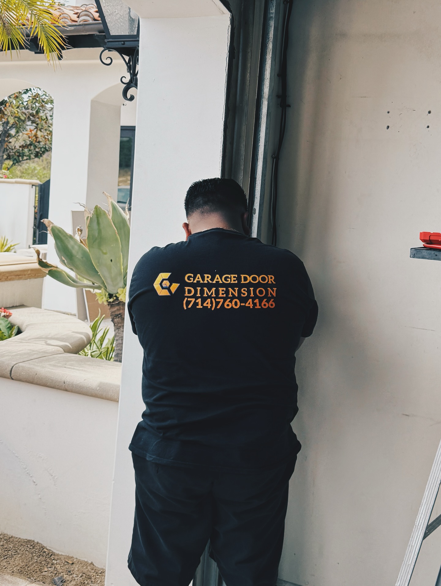 A certified garage door technician in Santa Ana