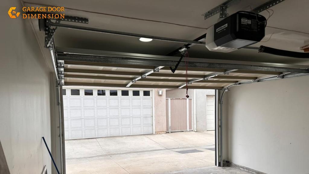 LiftMaster garage door opener in Santa Ana garage, showing typical opener setup and spring mechanism