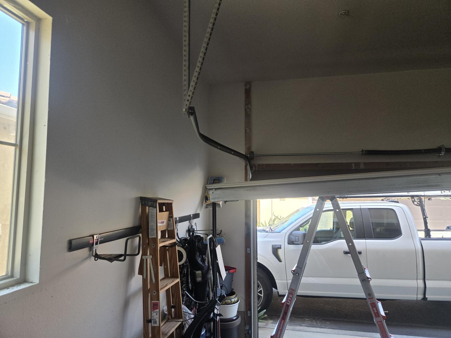 Off Track Garage Door Repair W Borchard Ave, Santa Ana, CA